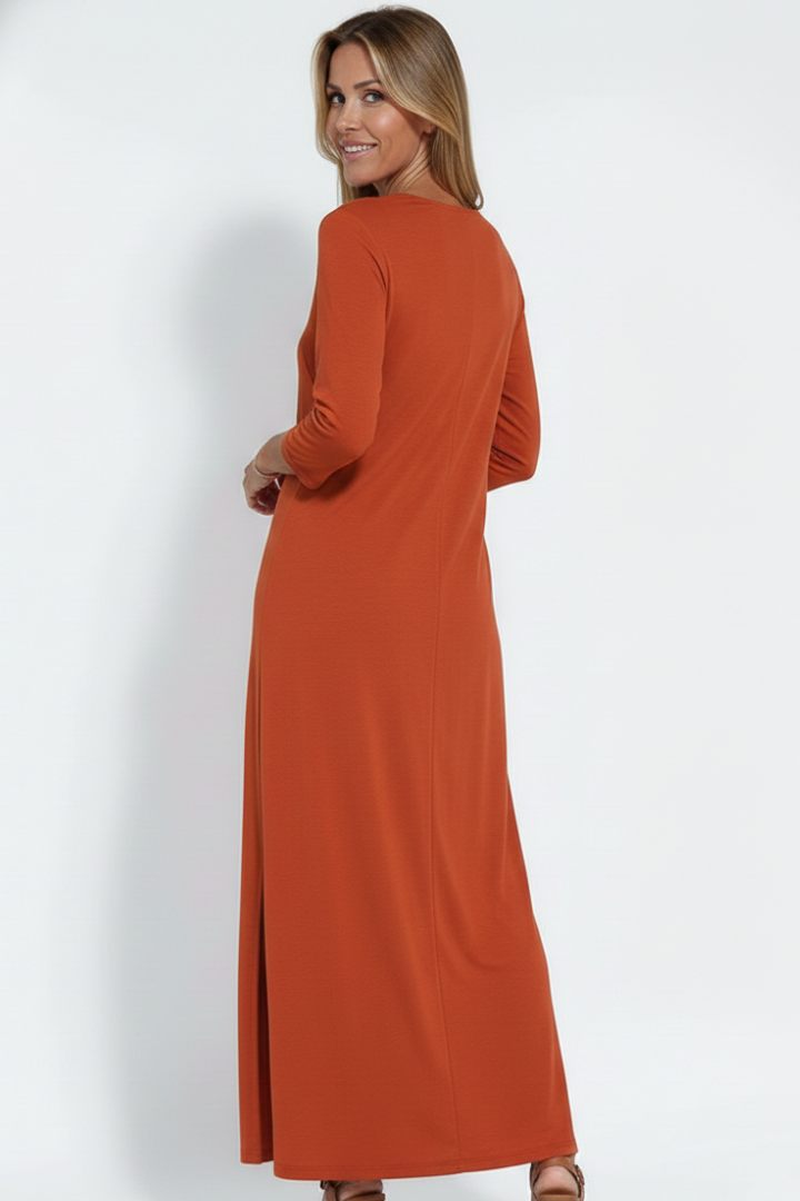 Casual women's V-neck maxi dress with a sophisticated side slit, perfect for summer comfort.