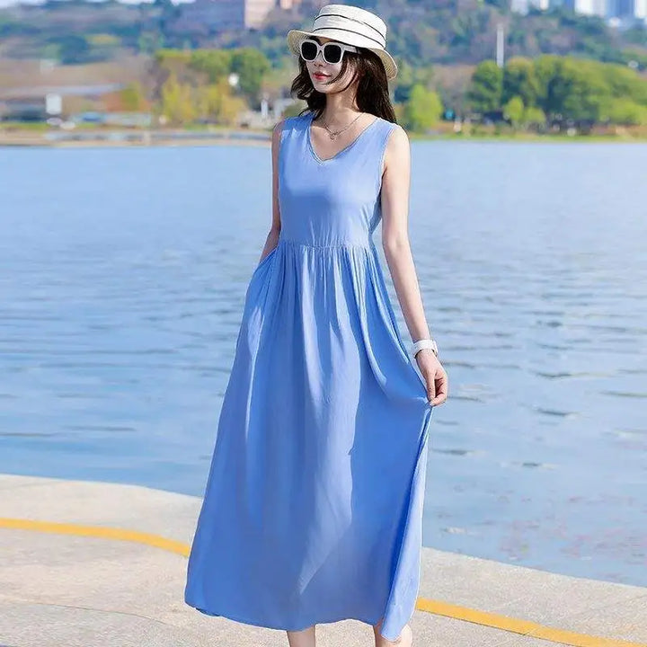 Comfortable & flowy V-neck maxi dress for women, with an adjustable tie waist and practical pockets.