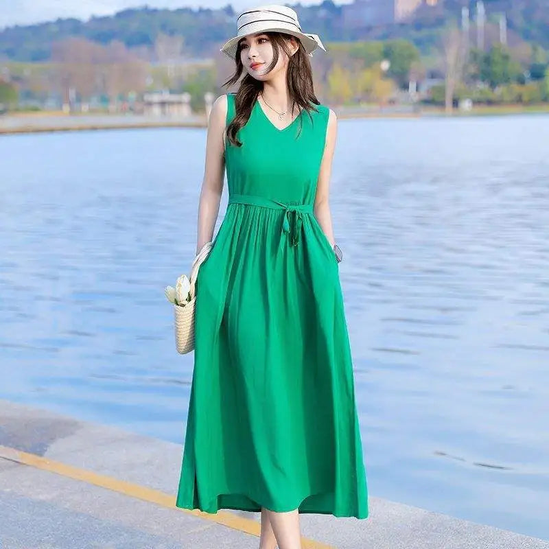 Versatile V-neck maxi dress for women, with a chic tie waist and practical pockets. Great for any occasion.