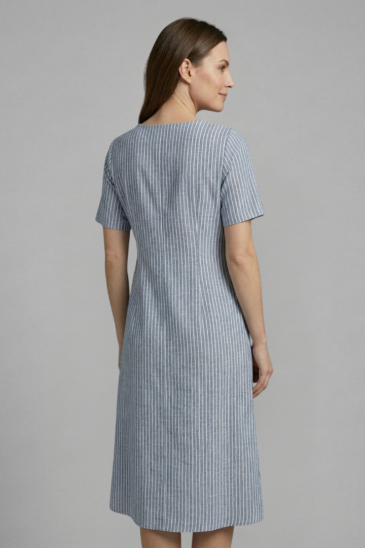 Stylish women's V-neck midi dress showcasing elegant button details, a chic choice for any casual or dressy occasion.