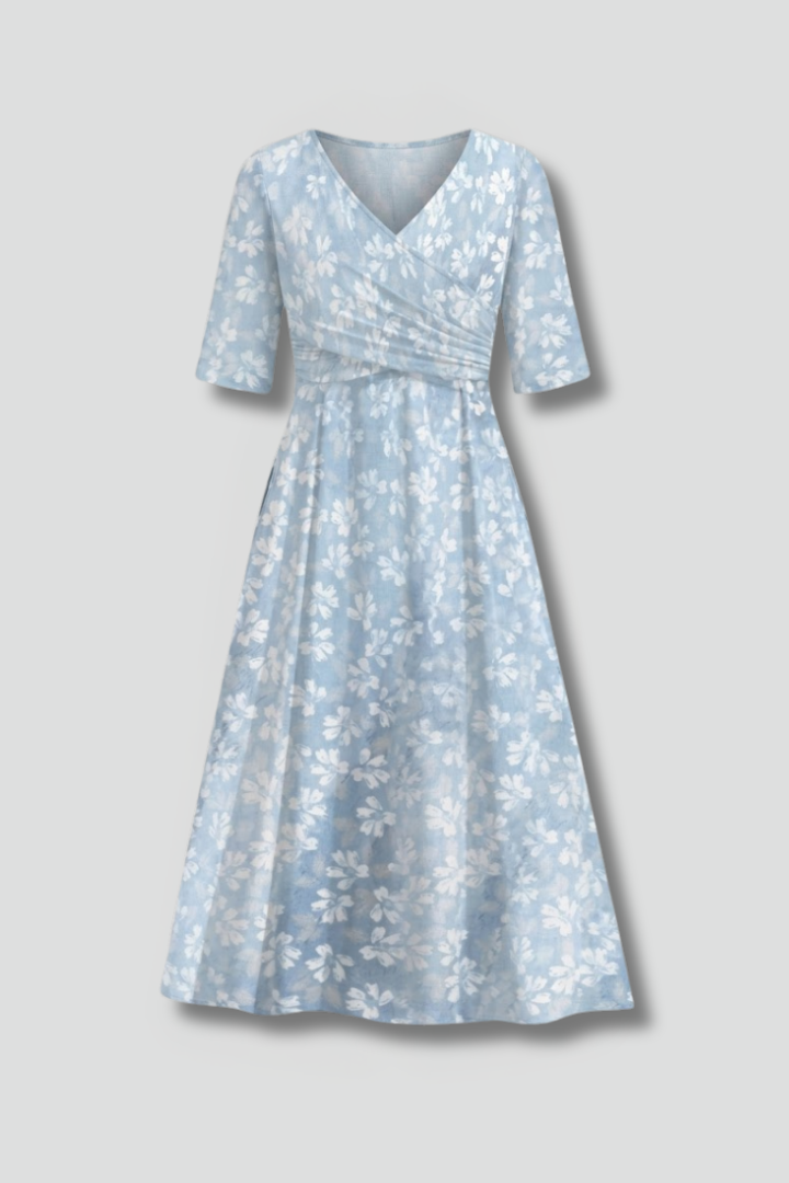Women's V-neck midi dress with short sleeves and practical pockets, perfect for casual everyday wear.