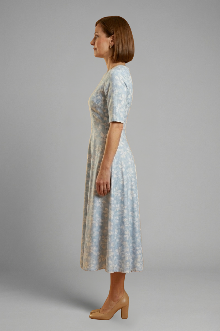 Blue V-neck midi dress for women, featuring short sleeves and convenient pockets, casual & stylish.