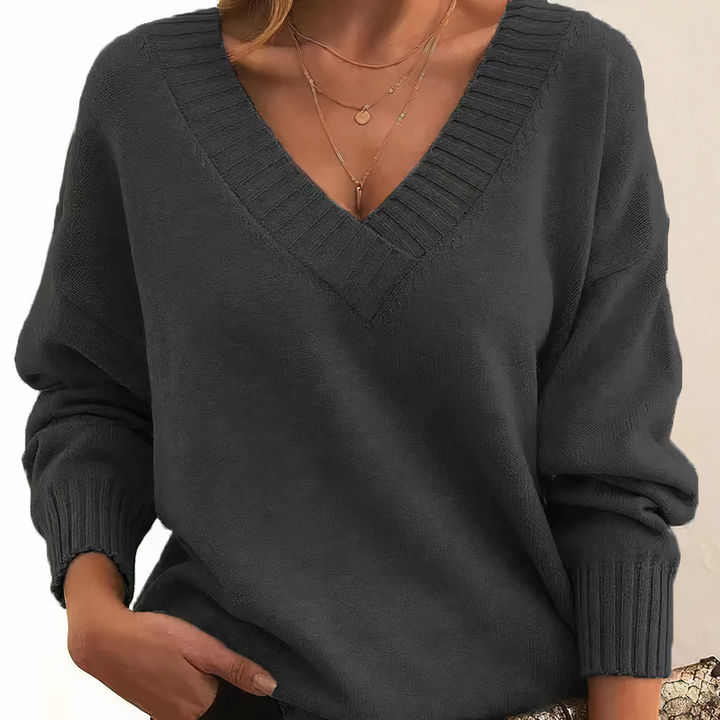 Versatile women's V-neck sweater with ribbed texture. Ideal for fall & winter outfits.