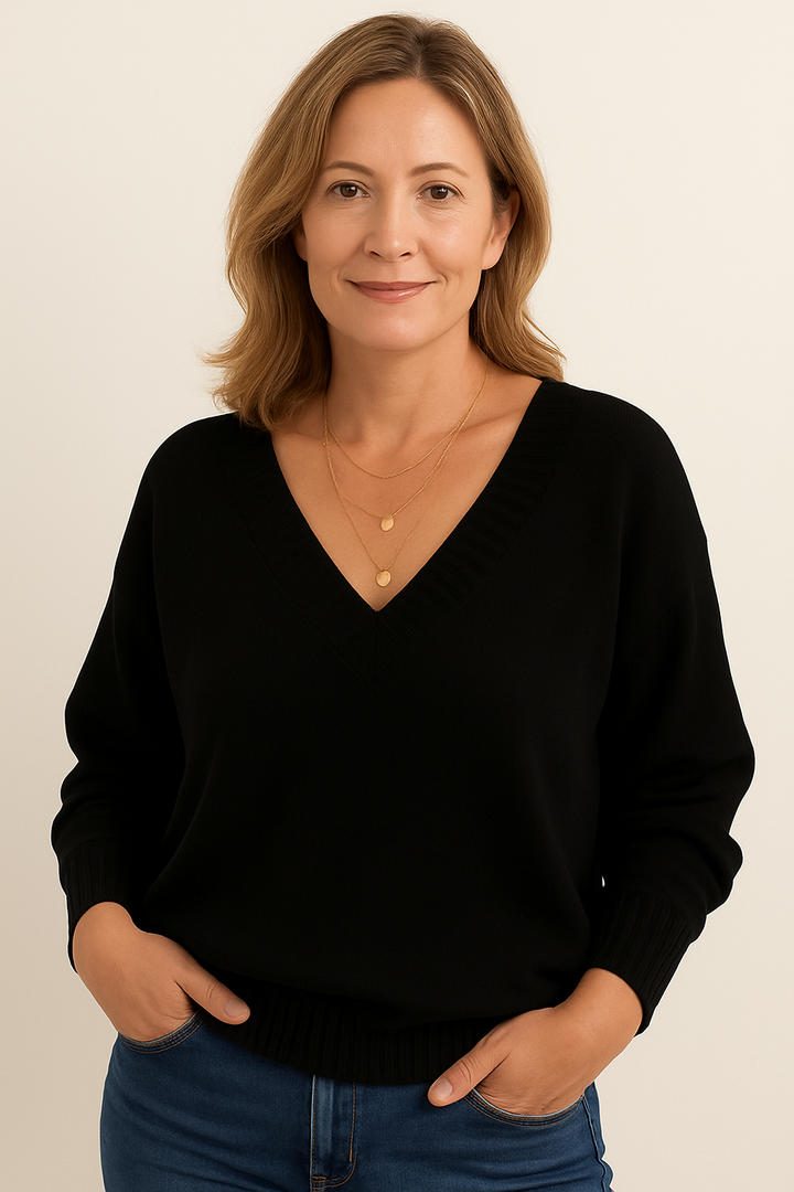 Cozy women's ribbed V-neck sweater. Long sleeves, relaxed fit for ultimate comfort.