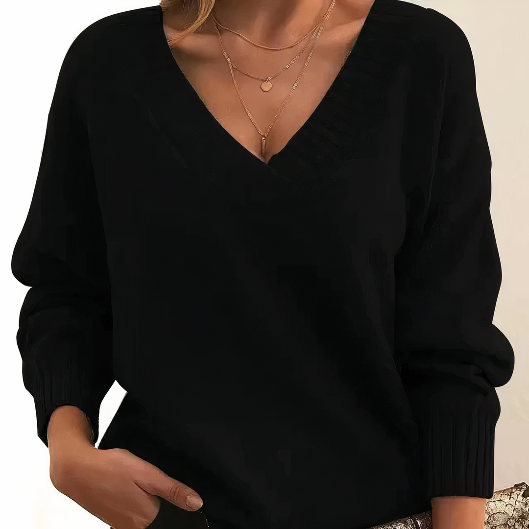 Stylish women's V-neck sweater, ribbed knit. Perfect casual wear top for fall.