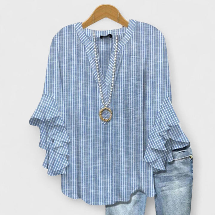 Effortless V-neck ruffle sleeve blouse for women, stylish & comfortable for daily wear.