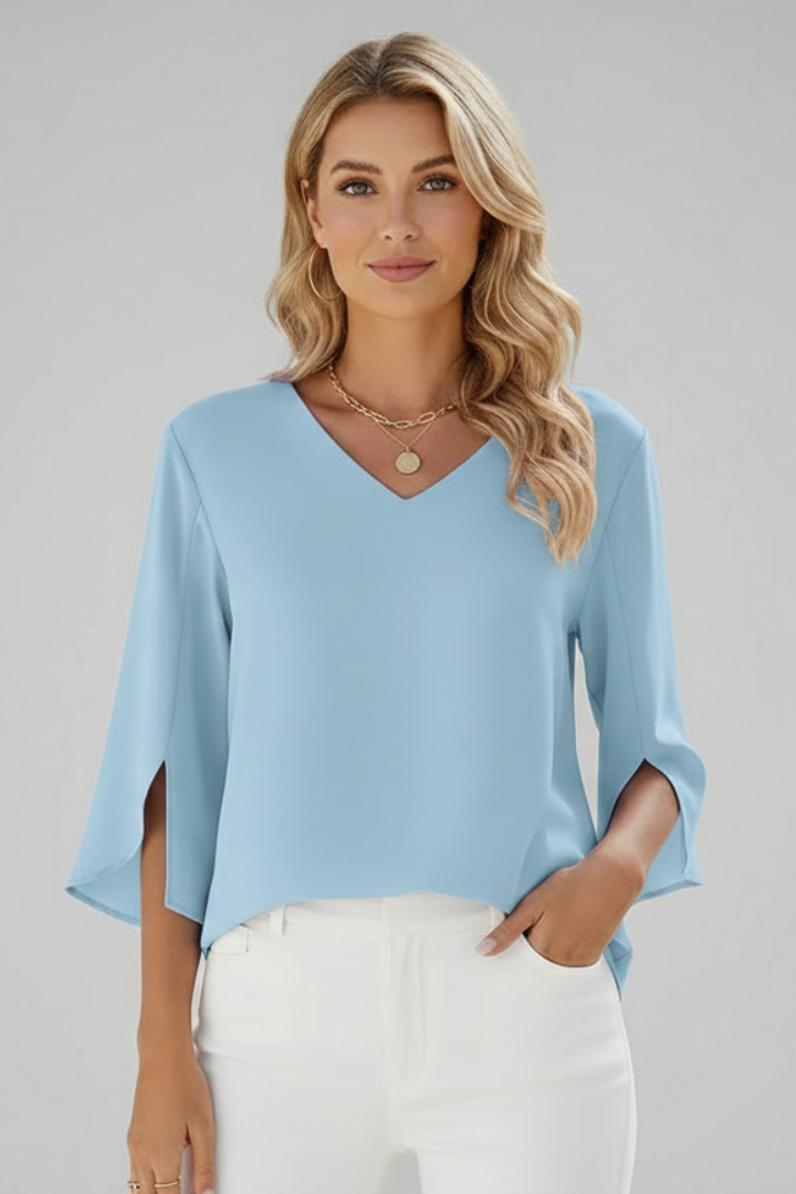 Effortless style women's V-neck short sleeve blouse, a relaxed fit top for casual and office looks.