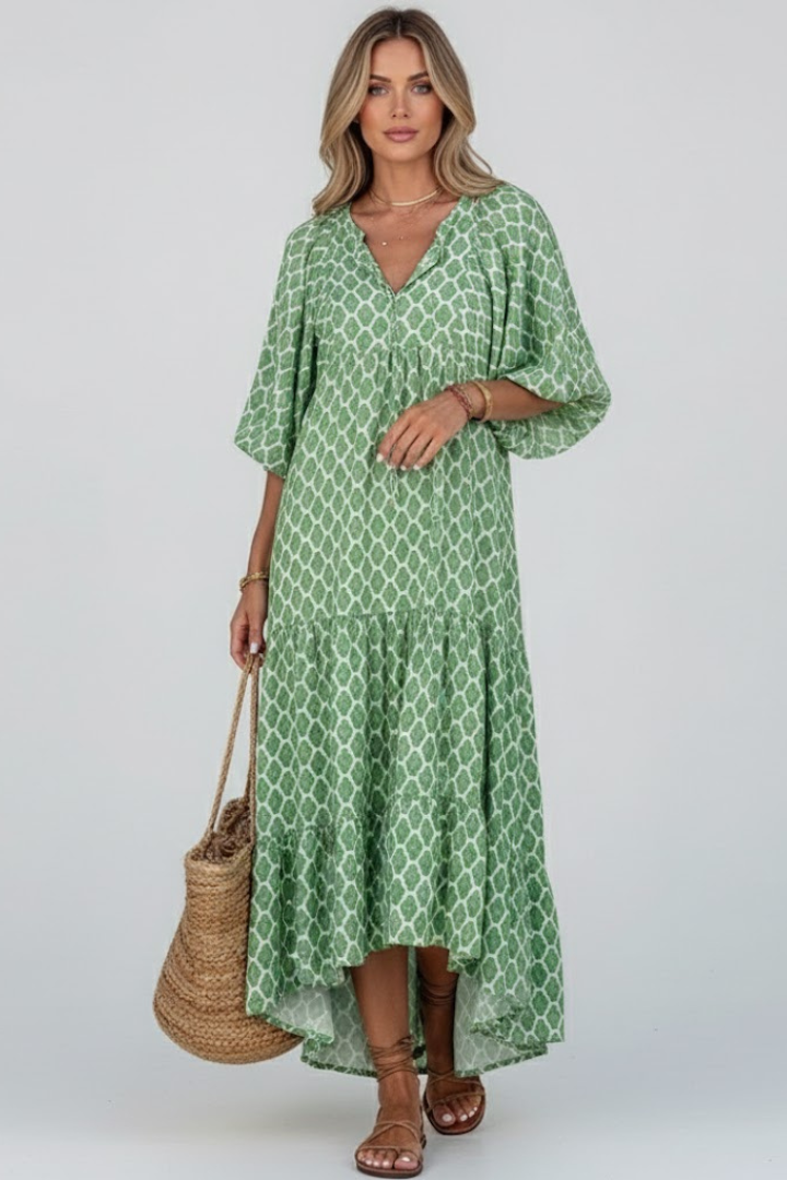 Elegant women's V-neck maxi dress with flowy short sleeves, ideal for comfortable summer casual wear.