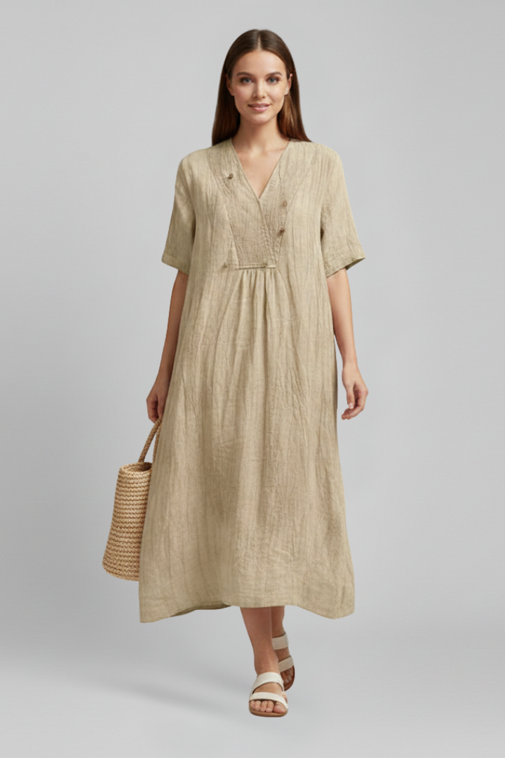 Women's V-neck short sleeve spotted fit & flare dress. Casual summer fashion with an elegant touch.