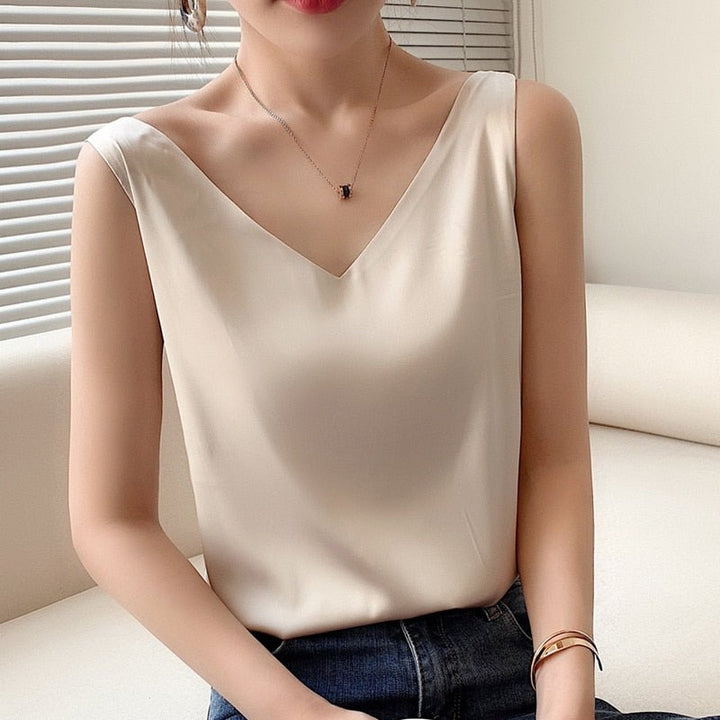 Modern ladies v-neck tank, loose fit, perfect casual top for warm weather or elegant layering.
