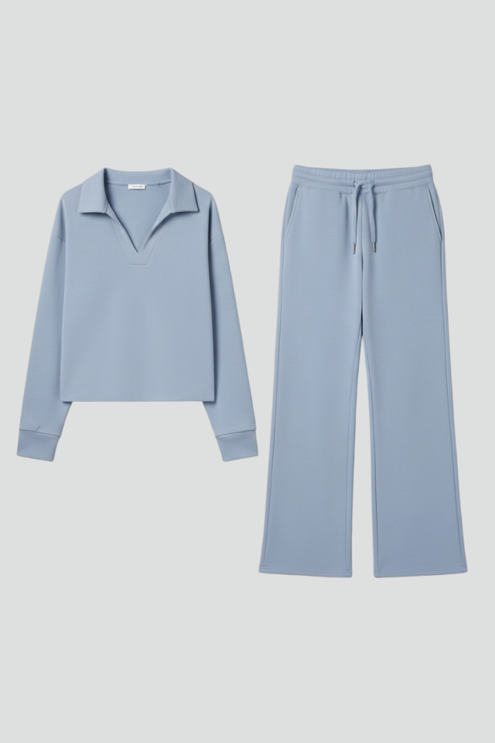 Women's V-neck top and wide-leg trousers set in soft fabric. Comfortable two-piece ensemble for stylish women.