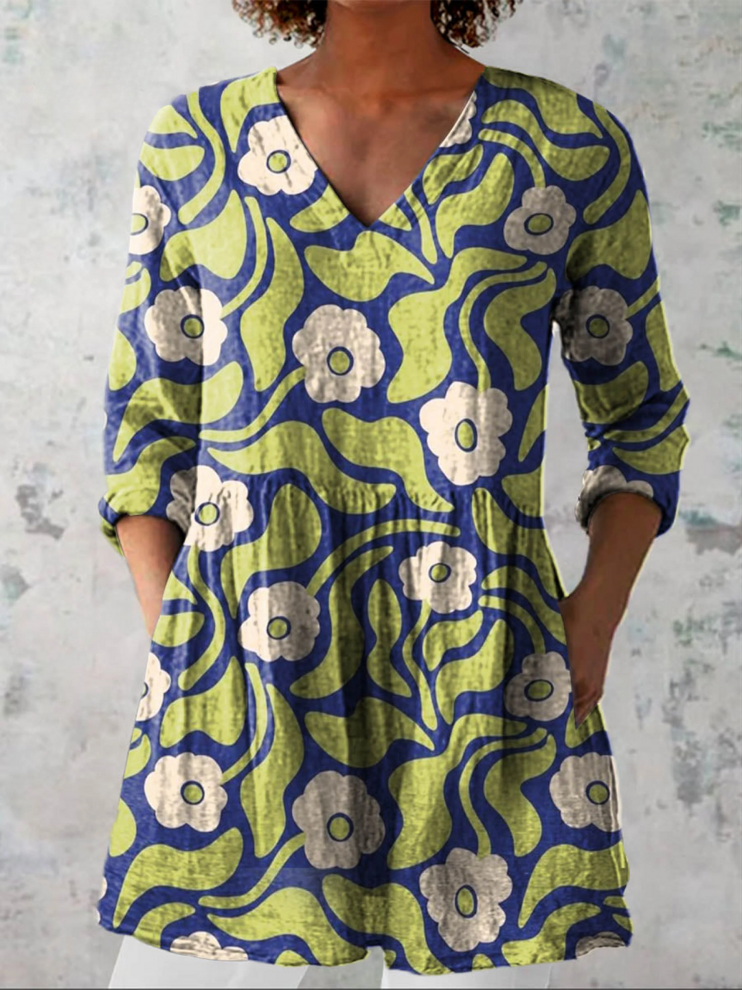 Women's V-neck tunic shirt with pockets, loose fit, 3/4 sleeves, ideal for beach holidays & casual summer wear.