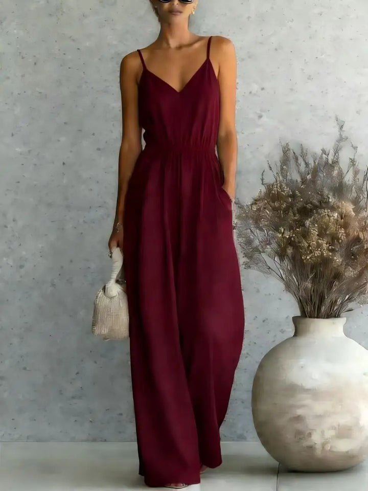 Elegant yet casual women's V-neck sleeveless jumpsuit with wide legs, great for summer outfits.