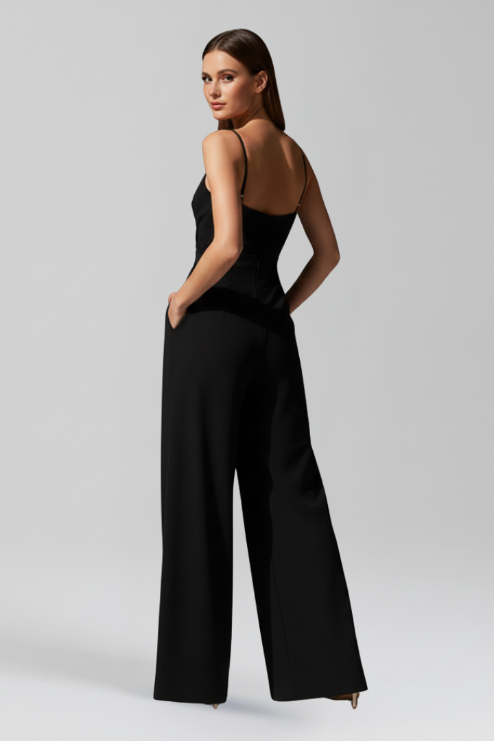 Chic women's wide leg jumpsuit with V-neckline, ideal for a comfortable & stylish summer outfit.