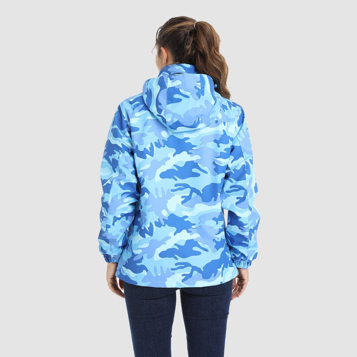 Woman running errands, stylish and dry in her Verona 3-in-1 waterproof jacket, essential outerwear.