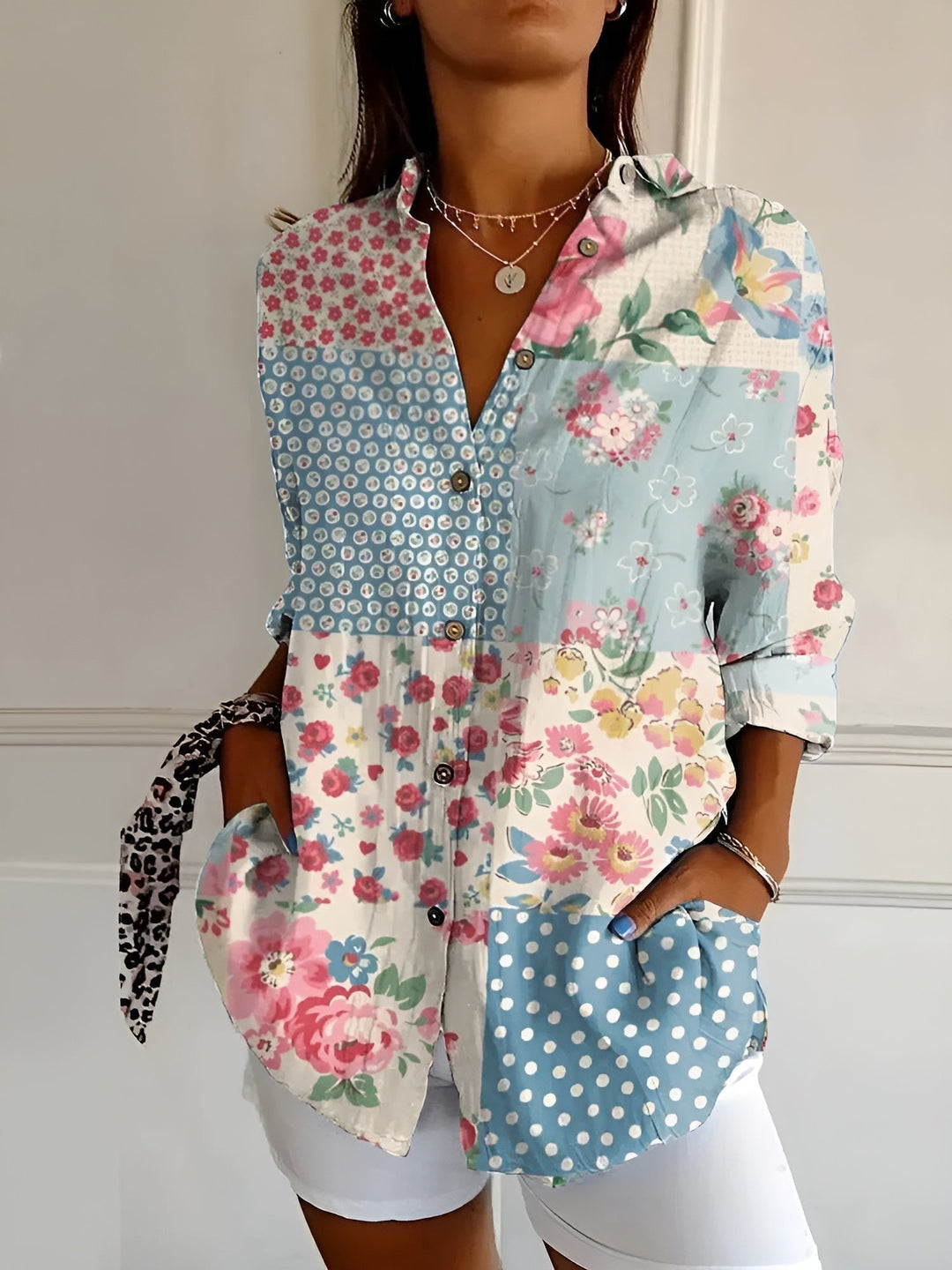 Elegant women's abstract print split neck blouse, perfect for fashion.