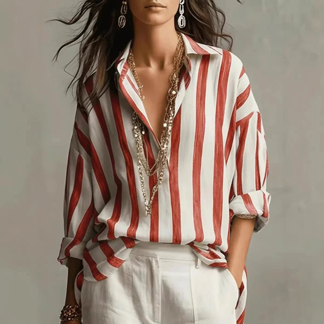 Stylish fall/spring women's vertical stripe blouse. Open collar, long sleeve top for a chic, comfortable look.