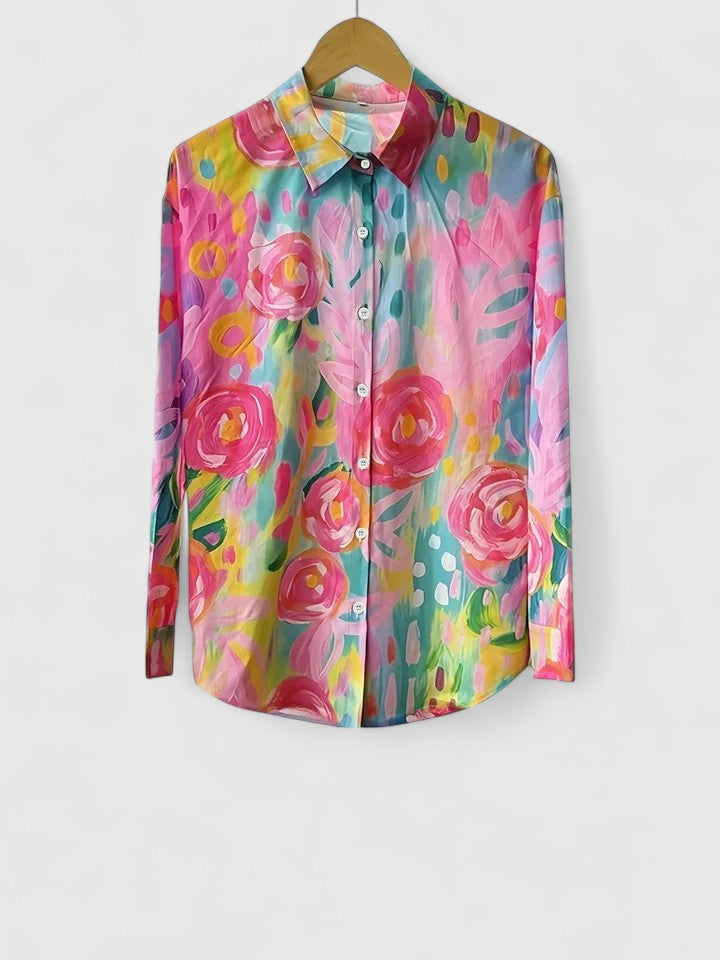 Artistic women's vibrant floral abstract print blouse, button-down with roll-tab long sleeves. Relaxed fit top.