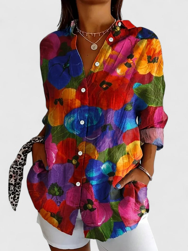 Statement women's vibrant floral abstract print blouse. Long sleeve, button-down. Ideal for summer casual chic.