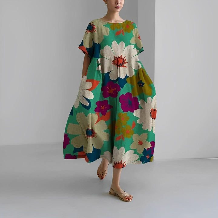 Versatile women's vibrant floral maxi dress, a comfortable casual summer outfit or vacation essential.