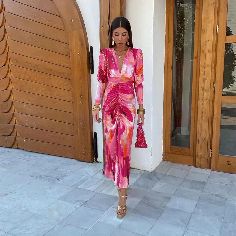 Stylish women's printed ruched midi dress with long sleeves and V-neck. Versatile for wedding guests & evening events.