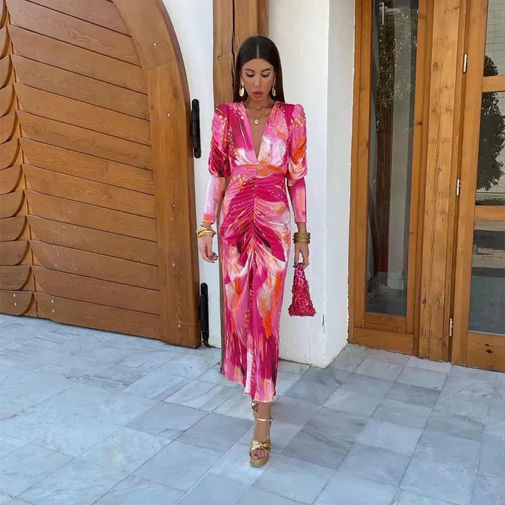 Stylish women's printed ruched midi dress with long sleeves and V-neck. Versatile for wedding guests & evening events.