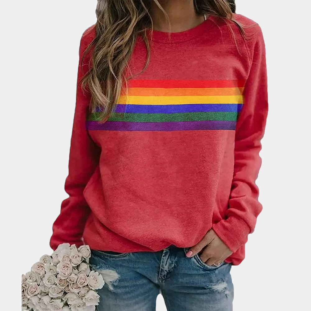 Fashionable women's rainbow stripe crewneck sweatshirt, offering vibrant color and cozy comfort for any casual outfit.