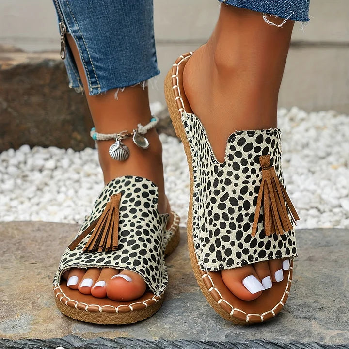 Comfortable women's everyday sandals with a durable flat sole for casual wear.
