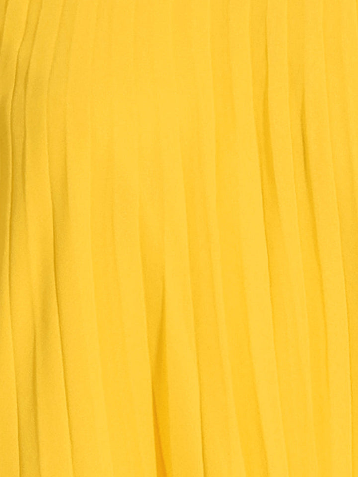 Women's bright yellow pleated swing dress. Features elegant cape sleeves & a high mock neck, perfect for events.
