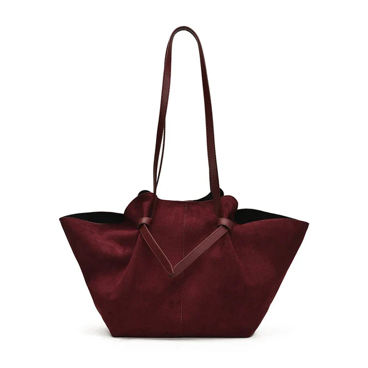 Front view of a women's vintage faux suede tote bag, spacious and practical for daily use