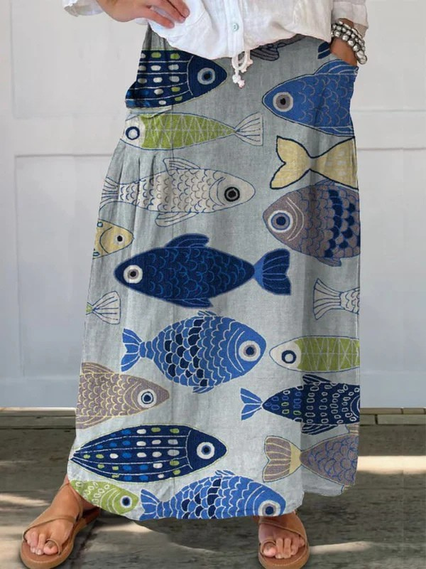 Women's vintage fish art print flowy A-line midi skirt with pockets & elastic waist, perfect for summer.