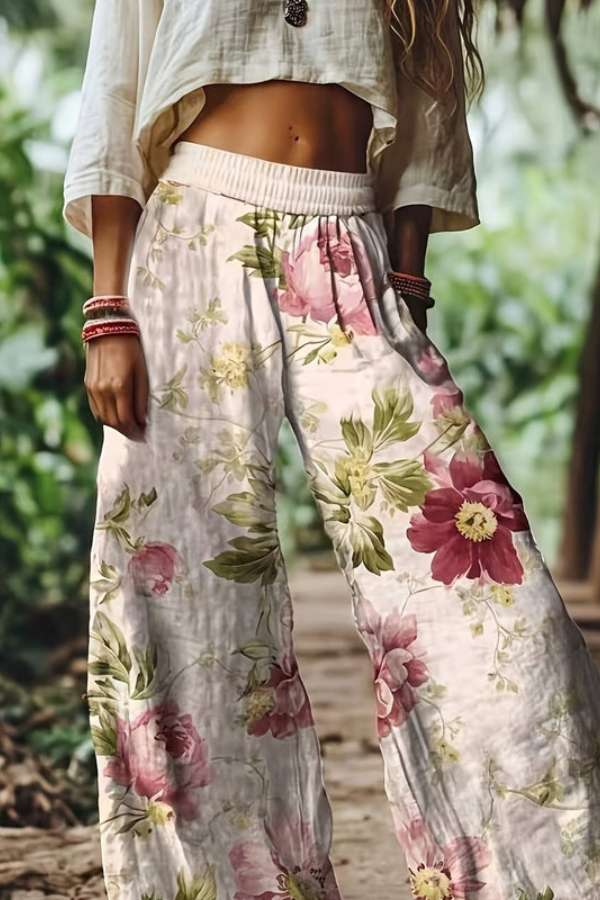 Women's cropped pants with a vibrant floral pattern, relaxed and lightweight.