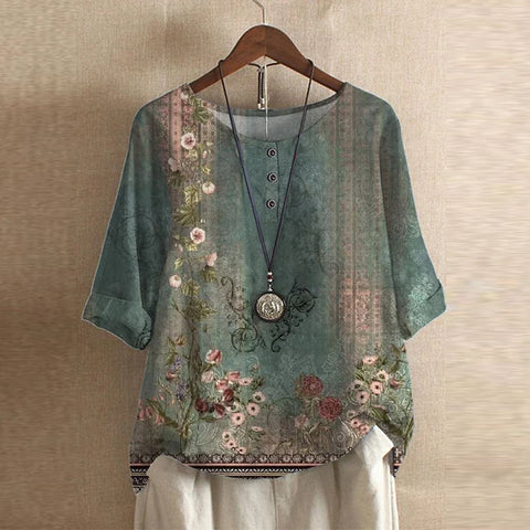Women's vintage floral print loose fit blouse, perfect for a bohemian summer look.