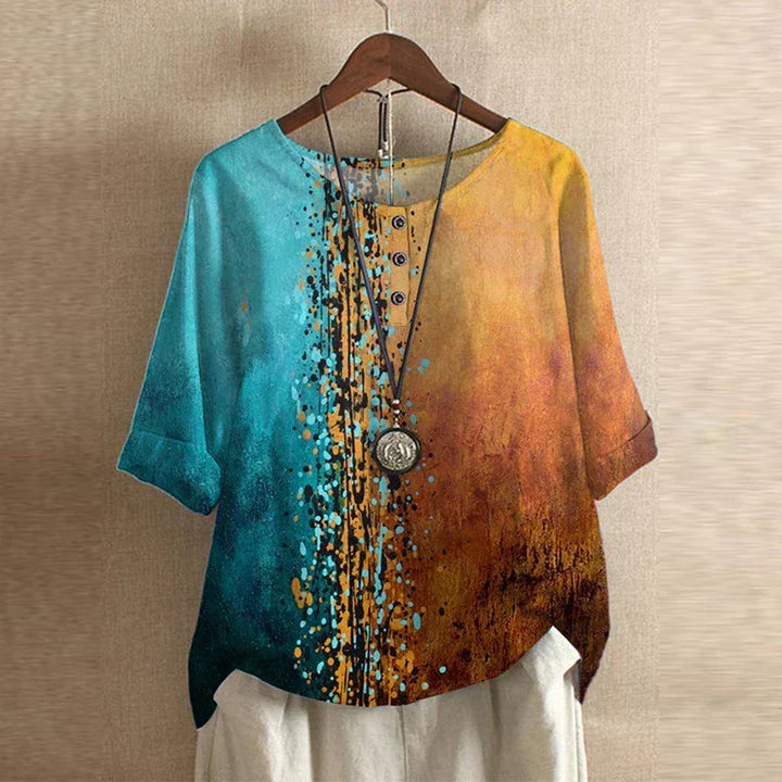 Fashionable women's vintage floral print blouse, loose and flowy, perfect for a chic bohemian summer.