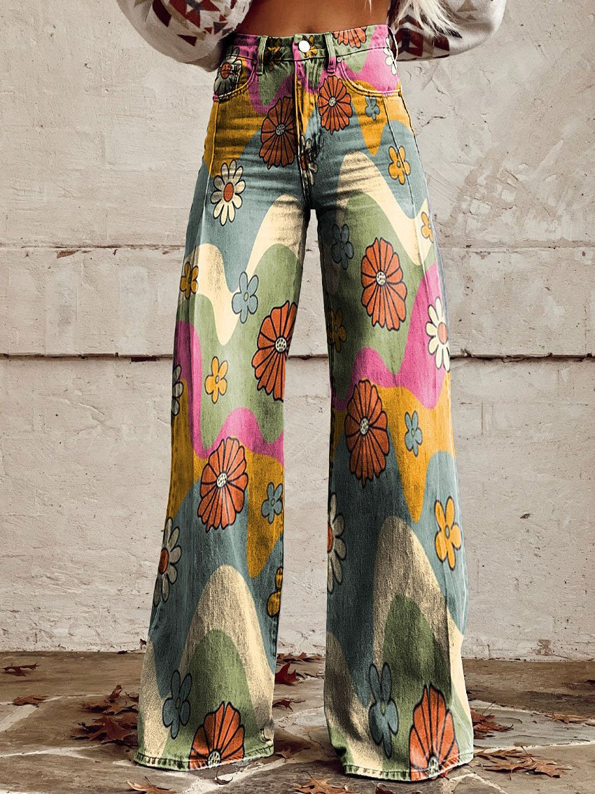 Close-up of the unique vintage floral print and denim texture on women's wide-leg flare jeans.