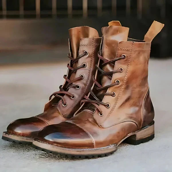 Women's vintage lace-up combat boots in black, featuring a sturdy sole & classic punk-rock style for fall & winter.