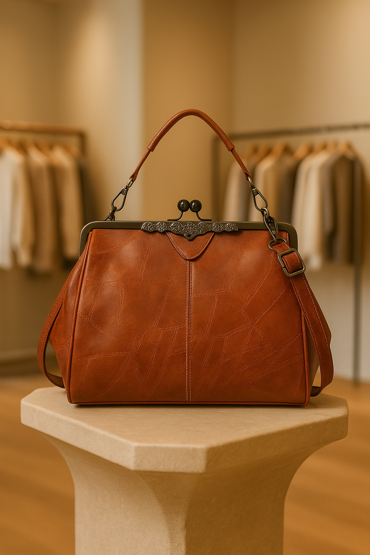 Women's vintage leather shoulder bag, classic design with adjustable strap, ideal for daily wear.