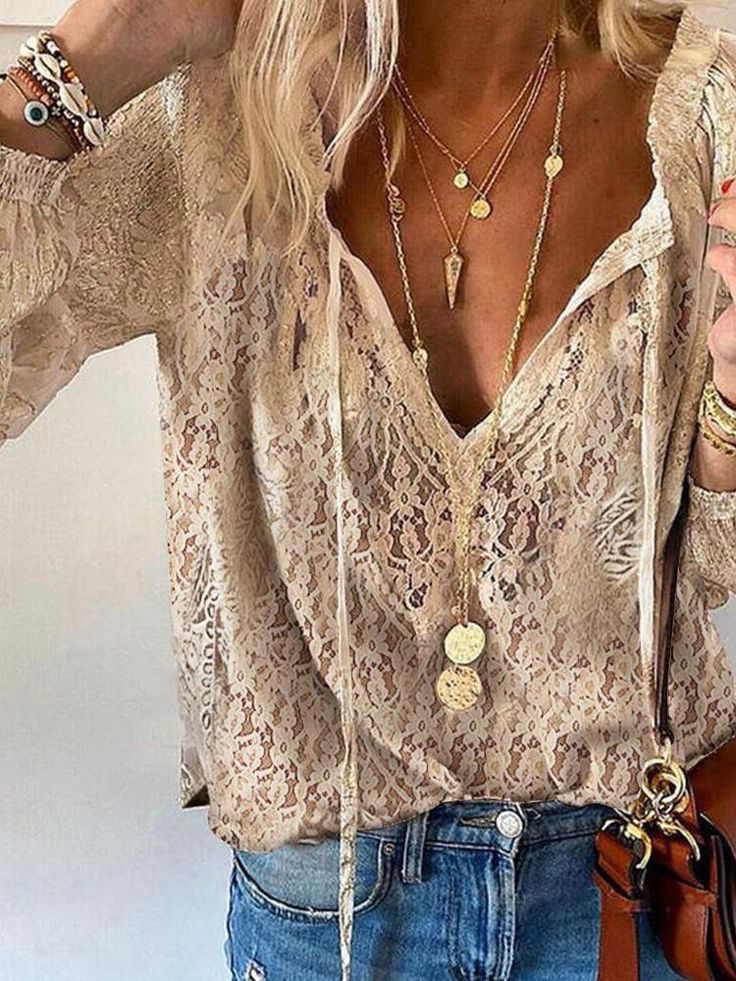 Flowing women's vintage bohemian top, featuring a stylish split neck for casual wear and relaxed everyday fashion.