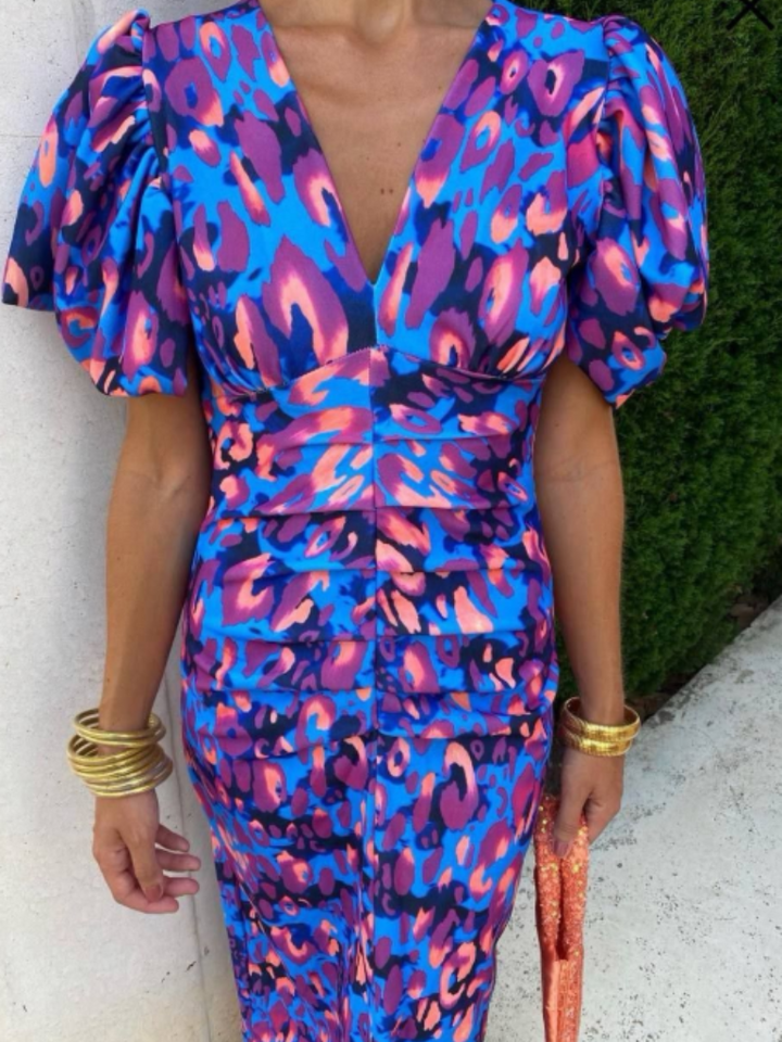 Stunning women's midi dress with vivid abstract print & ruched detail. An elegant, vibrant party dress.