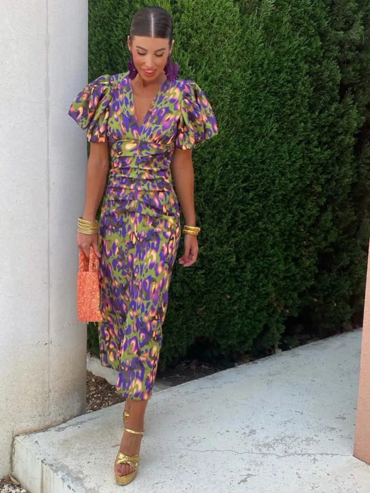 Women's vibrant blue, orange & green ruched midi dress with abstract print. Elegant occasion/party wear.