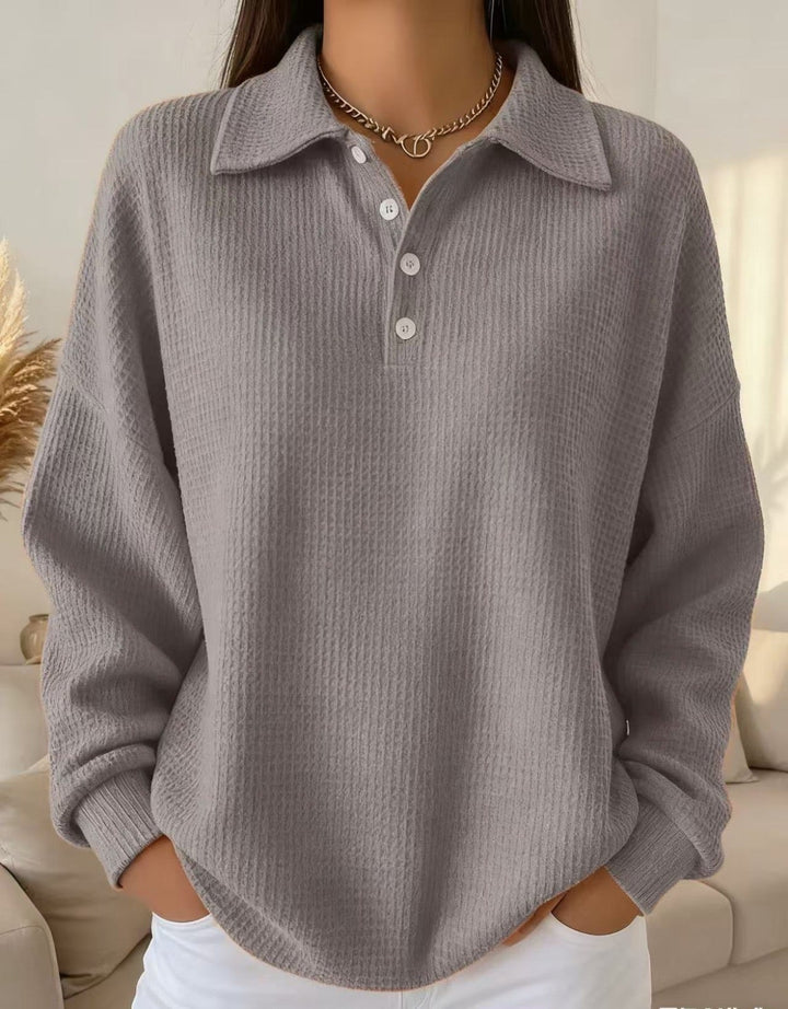 Versatile women's waffle collared Henley sweater. A stylish, relaxed fit pullover for chic autumn casual wear.