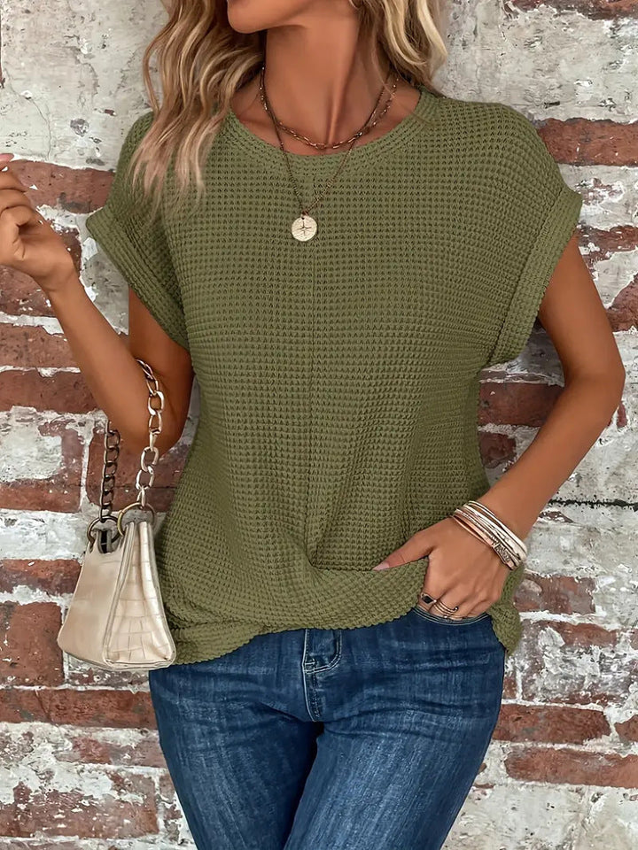 Versatile women's short-sleeve waffle tee. Chic twist front top for effortless style and everyday fashion.
