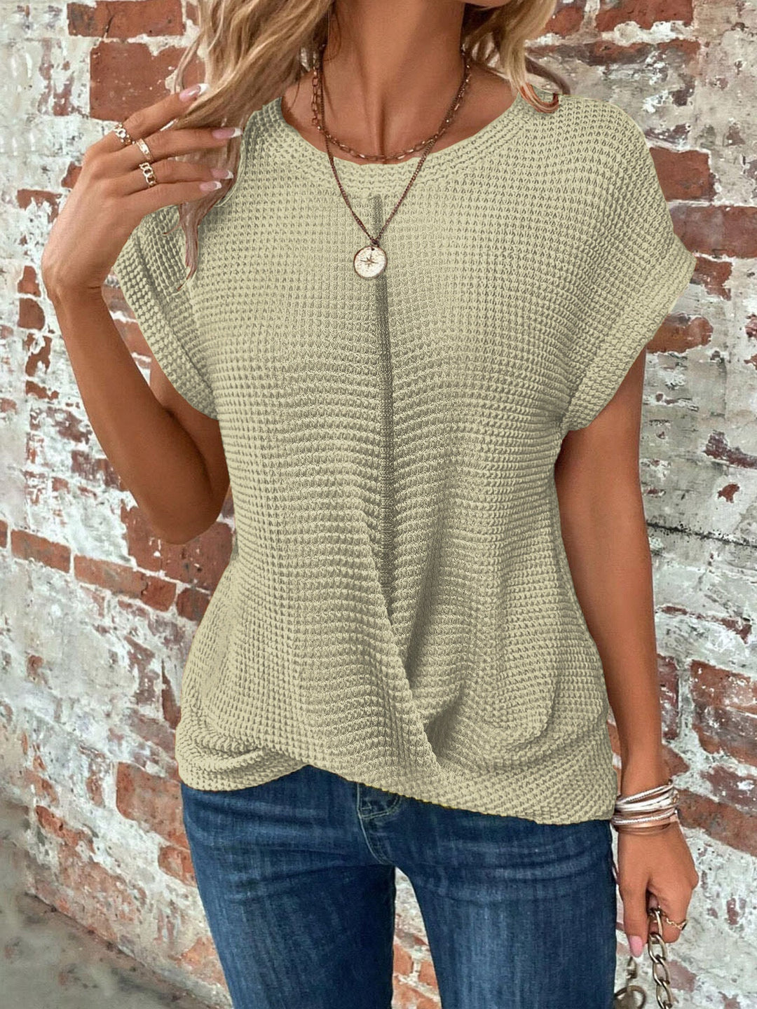 Elegant twist front waffle knit top for women. Comfortable short sleeve tee, perfect for versatile daily outfits.