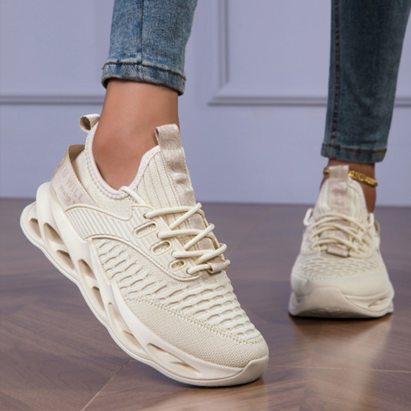 Lightweight women's walking sneakers with breathable design, ensuring flexible support & comfort.