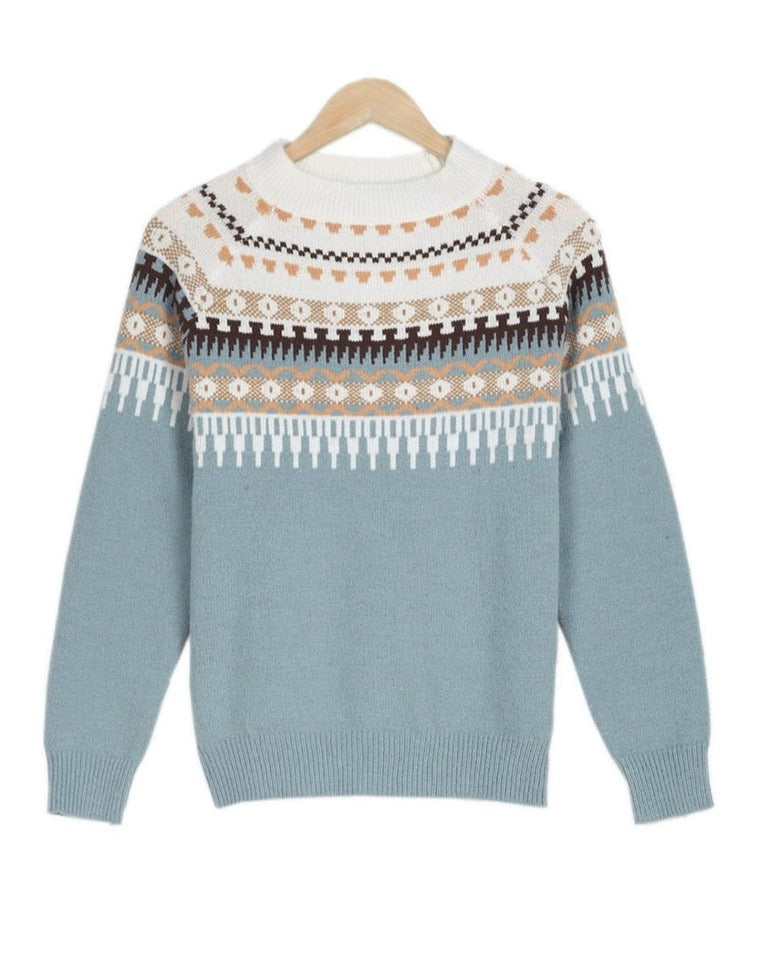 Women's warm, relaxed fit knit sweater. A versatile, long sleeve top for cozy fall and winter everyday fashion.