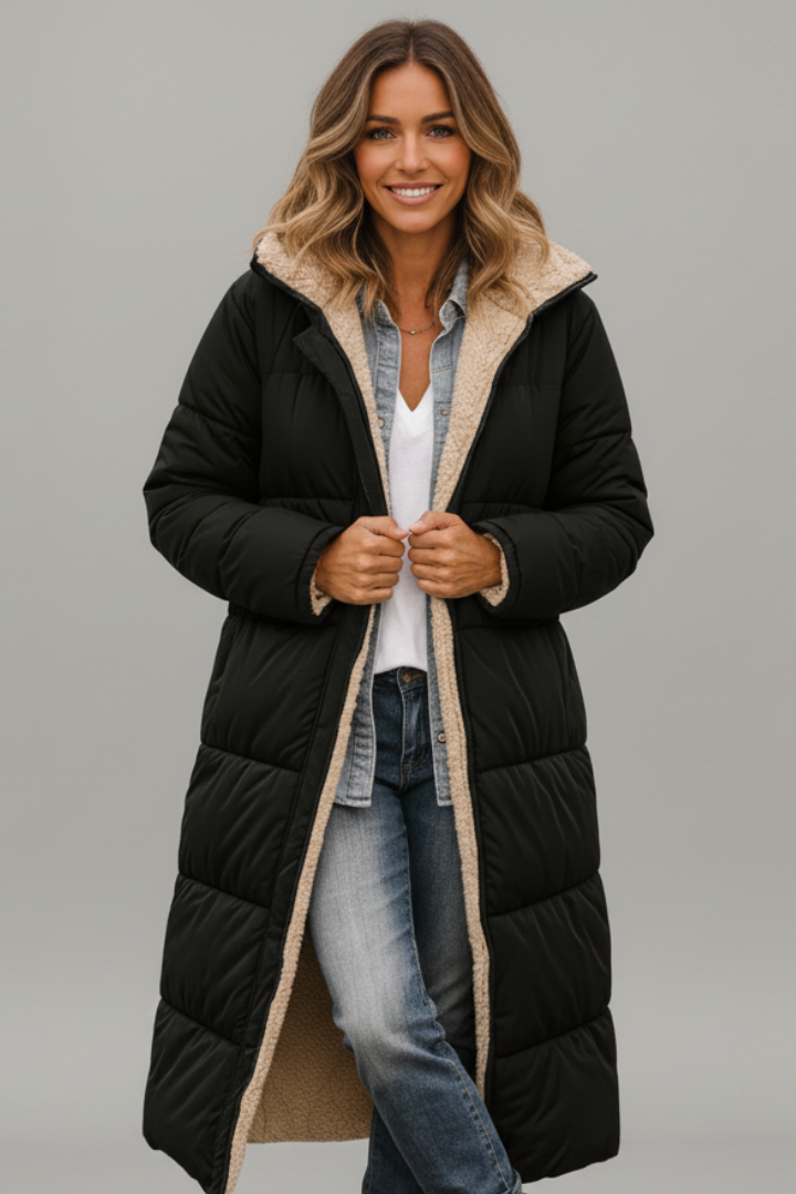 Cozy women's quilted long winter coat with hood & full zip. Ideal fall & winter fashion outerwear.