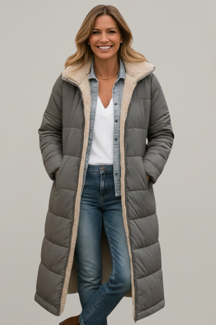 Elegant women's quilted long coat, hooded & full-zip. Chic winter fashion, perfect cozy outerwear.