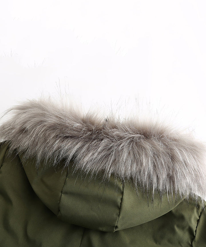 Front zipper closure on a women's warm parka, with protective storm flap