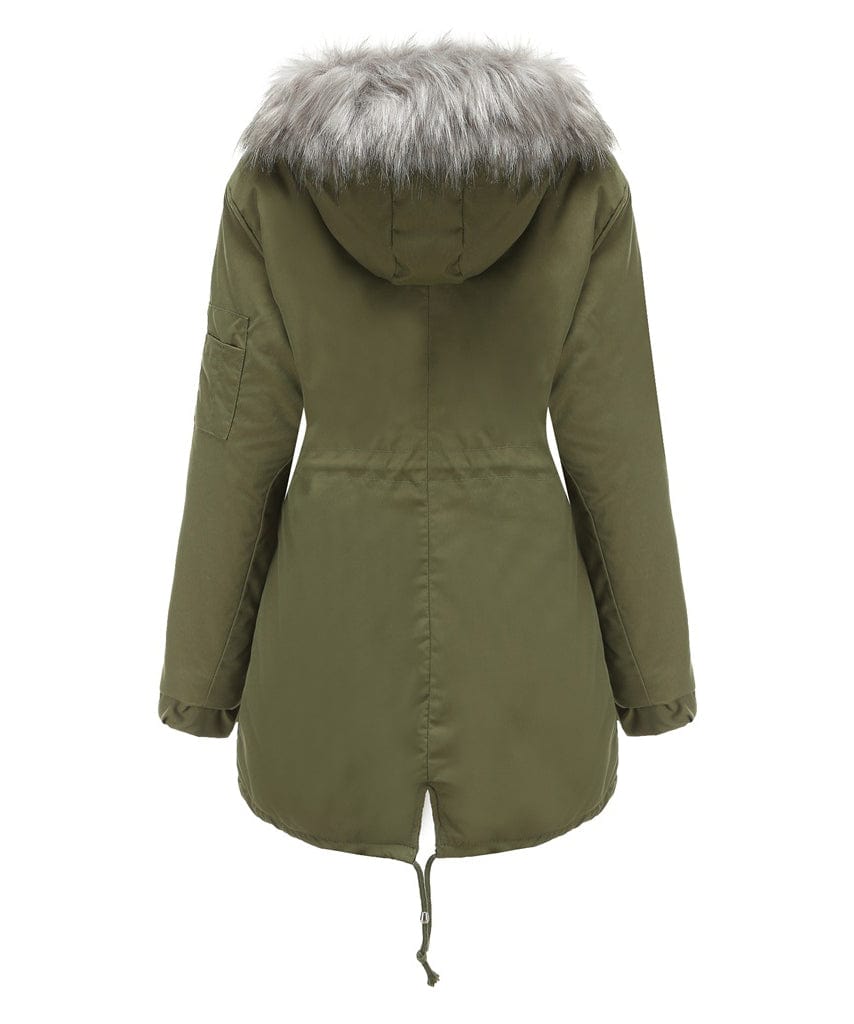 Woman wearing a sherpa-lined parka, ready for a cold weather hike