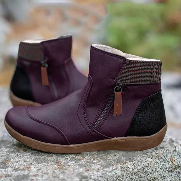 Women's comfortable waterproof ankle boots with side zipper closure. Great for fall and winter rain protection.